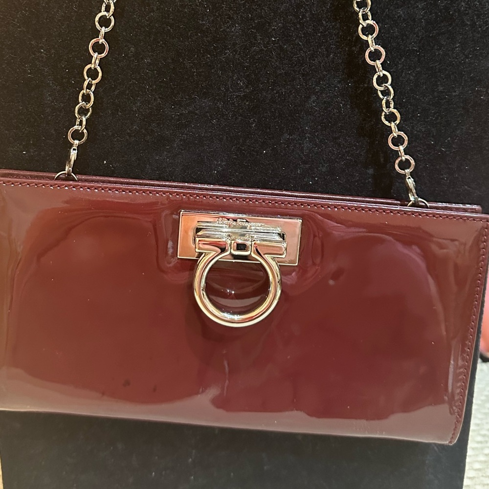 Authentic Salvatore Ferragamo clutch with chain